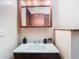 Bathroom vanity with mirror and elegant fixtures, and great lighting at 15523 Old Cheney Hwy, Orlando, FL 32828