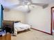 Cozy bedroom featuring a ceiling fan and comfortable bed with white linens at 15523 Old Cheney Hwy, Orlando, FL 32828