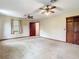 Large bedroom featuring carpet, neutral walls, and a window for natural light at 15523 Old Cheney Hwy, Orlando, FL 32828