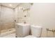 Bathroom featuring new vanity, fixtures and tile shower with marble flooring at 1582 Darlington Ave, Deltona, FL 32725