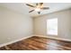 Cozy bedroom with a ceiling fan and natural light from the window at 1582 Darlington Ave, Deltona, FL 32725