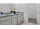 Elegant bathroom with granite countertops, double sinks, and a spacious layout at 2124 Monteverde, Davenport, FL 33896