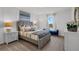 Comfortable bedroom featuring elegant decor, soft lighting, and a serene ambiance at 2124 Monteverde, Davenport, FL 33896