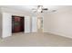 Bedroom with a ceiling fan and an open closet at 235 Nob Hill Cir, Longwood, FL 32779