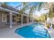 Spacious screened-in pool area with covered patio, providing a perfect outdoor retreat for leisure and relaxation at 235 Nob Hill Cir, Longwood, FL 32779