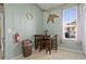 Bright kitchen nook with breakfast table and chairs, offering natural light and a cozy dining space at 2511 Calabria Ave, Davenport, FL 33897