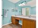 Bathroom highlighting a double sink vanity and ample counter space at 3200 Utah Dr, Deltona, FL 32738