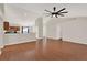 Bright living room showcases seamless flow, wood floors, and an open layout, providing a flexible space for relaxation at 3200 Utah Dr, Deltona, FL 32738