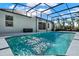 Sparkling pool surrounded by a screened enclosure for year-round enjoyment at 3200 Utah Dr, Deltona, FL 32738