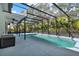 Large screened pool with ample deck space for outdoor entertaining at 3200 Utah Dr, Deltona, FL 32738