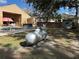 Wide view of the backyard featuring a pool, shed, and propane tank at 3220 Town And Country Rd, Oviedo, FL 32766