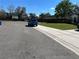 Street view of blue SUV parked next to brick wall at 3220 Town And Country Rd, Oviedo, FL 32766