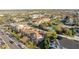 An aerial view of the neighborhood, highlighting its lush greenery and community pool at 4038 Hunters Park Ln, Orlando, FL 32837