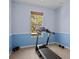 Home exercise room featuring a treadmill with a large window view at 4119 Navigator Way, Kissimmee, FL 34746