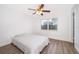 Bedroom with hardwood flooring, ceiling fan, and double pane windows at 4303 Tomlinson Cir, Orlando, FL 32829