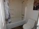 Cozy bathroom features a shower and tub combo with a decorative shower curtain at 4340 Lakeway Dr # H, Orlando, FL 32839