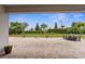 Enjoy the serene view from the covered patio, overlooking the spacious brick-paved backyard and well-maintained greenery at 4622 Fairy Tale Cir, Kissimmee, FL 34746