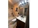 Modern bathroom with a shower and a tub with marble tile at 4706 Kimball W Ct, Lakeland, FL 33813