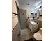 Bathroom featuring a white vanity, tiled walls, and modern fixtures at 4706 Kimball W Ct, Lakeland, FL 33813