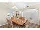 Cozy dining room with a wood table and ornate chairs, perfect for Gathering meals at 523 Higher Combe Dr, Davenport, FL 33897