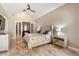 Primary bedroom with a fireplace, neutral tones, and an abundance of natural light from windows at 5524 Sail Ct, Orlando, FL 32819