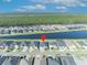 Wide aerial view of the community and home featuring a water view at 585 Mosaic Blvd, Daytona Beach, FL 32124