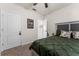 Inviting bedroom with neutral walls, carpeted floor, and stylish decorative accents at 650 Peyton Brooke Way, Winter Haven, FL 33881