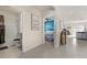 Hallway view leading to the bathroom, Bedroom, and a glimpse of the kitchen at 650 Peyton Brooke Way, Winter Haven, FL 33881