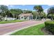 Charming guard house and sign for the Orange Tree community at 7037 Edgeworth Dr, Orlando, FL 32819