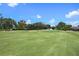 Beautiful wide open golf course on a sunny day at 7037 Edgeworth Dr, Orlando, FL 32819