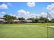 Scenic view of the golf course and houses at 7037 Edgeworth Dr, Orlando, FL 32819