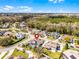 Neighborhood aerial view highlighting lush landscaping and tree coverage with a serene and desirable location at 739 Spring Island Way, Orlando, FL 32828