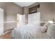 Cozy bedroom featuring neutral paint, hardwood floors, closet and plenty of light at 739 Spring Island Way, Orlando, FL 32828