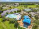 Aerial view of community pool and playground, offering recreational amenities for residents at 739 Spring Island Way, Orlando, FL 32828