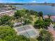 Enjoy tennis courts and stunning lake views in this community, perfect for an active lifestyle at 8012 S Madeira Ct, Orlando, FL 32836