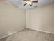 Serene bedroom features a ceiling fan and neutral walls, creating a relaxing space at 8323 Bella Vida Cir, Davenport, FL 33896