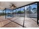 Expansive screened-in patio with a beautiful pool, ideal for relaxation and entertaining at 8712 Irmastone Way, Orlando, FL 32817