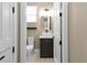 Modern bathroom with a stylish vanity, a vessel sink, and a large mirror, creating a fresh space at 909 E Central Blvd, Orlando, FL 32801