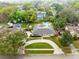 Aerial view of a home showcasing its landscaping, roof, and surrounding neighborhood at 922 Puma Trl, Winter Springs, FL 32708