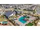 Aerial view of community featuring pool, cabana, and playground at 9834 Introduction Way, Orlando, FL 32832