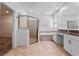 Bathroom featuring a shower with glass doors, a garden tub, and double sink vanity at 9834 Introduction Way, Orlando, FL 32832