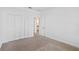 Bedroom with neutral carpet and standard closet at 9834 Introduction Way, Orlando, FL 32832