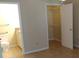 Bedroom featuring a connecting bathroom and walk-in closet for added convenience at 1029 S Hiawassee Rd # 2414, Orlando, FL 32835
