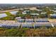 New homes feature modern architecture, in a community with lush landscaping and convenient parking at 10364 Ebb Tide Ln, Orlando, FL 32821