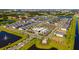 Expansive new development with modern townhomes, community amenities, and scenic water features at 10364 Ebb Tide Ln, Orlando, FL 32821