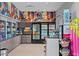 Modern market area offers snacks, drinks, beach accessories with eye catching geometric wall design at 10364 Ebb Tide Ln, Orlando, FL 32821