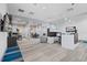 Contemporary office space with glass-enclosed meeting rooms and modern furnishings at 10364 Ebb Tide Ln, Orlando, FL 32821