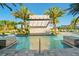 Stunning pool with a cascading waterfall feature, perfect for relaxation and leisure at 10364 Ebb Tide Ln, Orlando, FL 32821