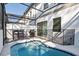 Relaxing pool with patio area, grill, and outdoor seating at 10364 Ebb Tide Ln, Orlando, FL 32821