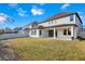 Expansive backyard with lush lawn and white fence, ideal for outdoor activities and entertaining at 11464 Beau Repost Dr, Orlando, FL 32832